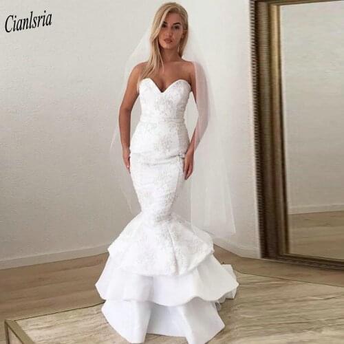Romantic Sweetheart Sleeveless Appliques Lace Dubai Arabic Mermaid Wedding Dresses Open Back Tiered Ruffles Saudi Bridal Gowns