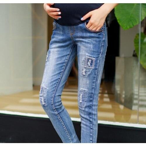 New spring and summer Fall New Maternity Pants was thin fried Washed Denim flower pencil pants care of pregnant women belly