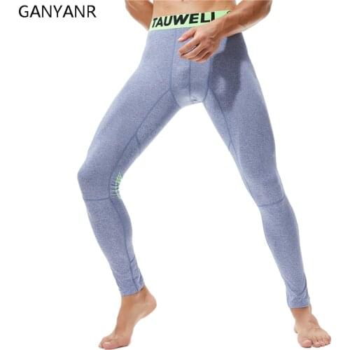 GANYANR Running Tights Men Basketball Sports Fitness Legging Compression Pants Gym Athletic Bodybuilding Jogging Winter Pouch