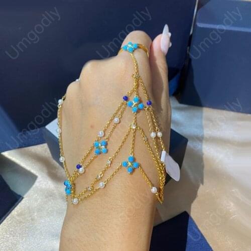 UMGODLY Fashion Demon Ring Gold Color Pearl and Blue Gem Stone Double Ring Chain Cross Medal July New Women ROMA Jewelry Gift