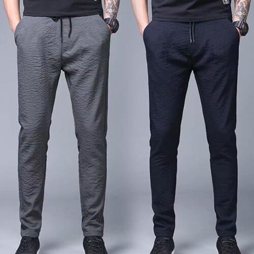 2021 New solid Leggings Men 's Big Plus Size Trend Fat Loose Summer Thin Sports Leisure Versatile Haren Ice Elastic Pants M-5XL