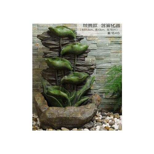 Large rockery waterscape lotus leaf. Water fountains. Humidifier