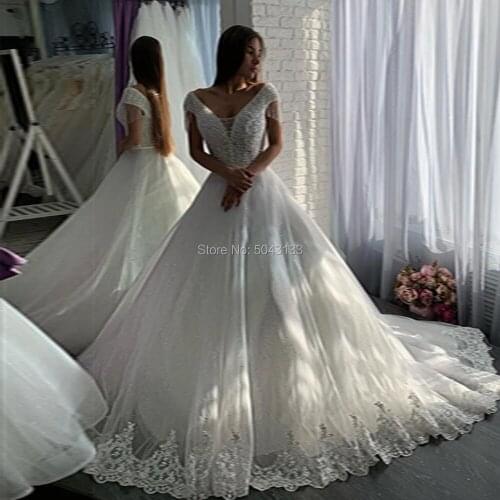 2020 Luxury Sequin Tulle Crystals Wedding Dresses with Appliques V Neck Off the Shoulder Lace Up Bridal Gowns Cathedral Train