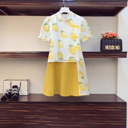 Large size female yellow suit skirt 2021 summer new lemon print irregular top and A line skirt casual two-piece set women cloth