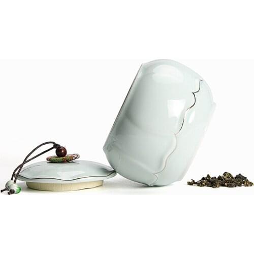 Mu Tao tea pot ceramic household large storage tank sealed pot tea warehouse gold creative packaging Tea caddy large jar te