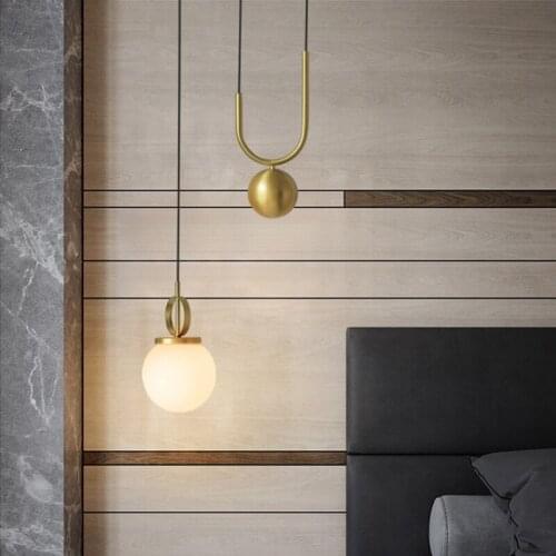 Post-modern restaurant chandelier creative personality bar gold-colored lifting glass ball bedroom bedside chandelier