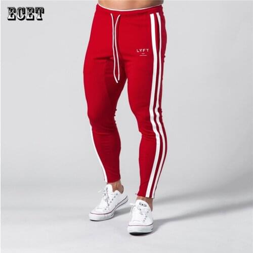 Muscle fitness mens sports pants mens trousers outdoor fitness exercise training feet Slim streetwear casual pants