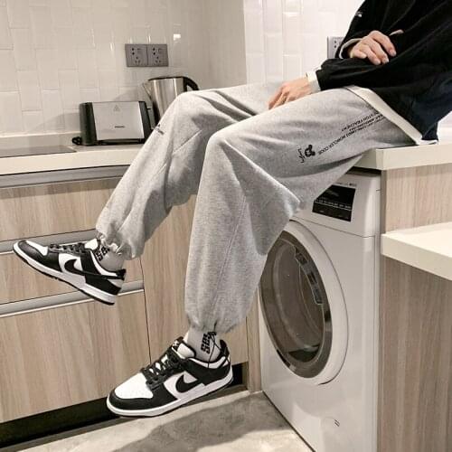 2021 New Mens Casual Pants Fashion Sweatpants Korean Drawstring Solid Elastic Bandage Jogging Pants