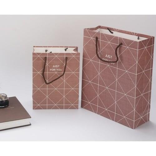 UV Protected Hot stamping paper bags with silver foil black gift bags with gold foil Shenzhen manufacturer --XP2384