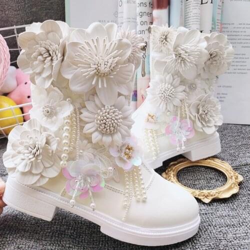 Front zip bootie high flat womens shoes spring and autumn flower tassel Korean shoes