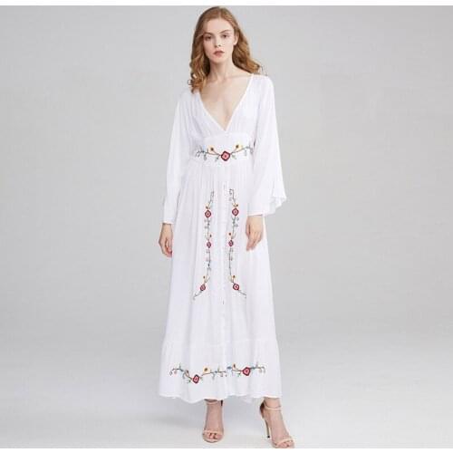 Summer Bohemian holiday beach holiday dress ethnic style retro embroidery deep V collar horn sleeve solid color long dress