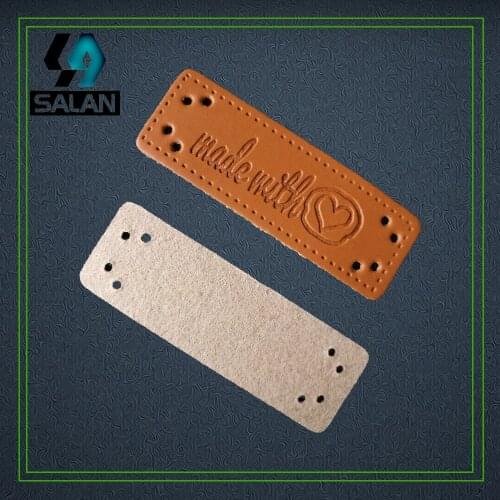 Wholesale stock made with heart Leather labels leather sewing tags leather decoration for handwork custome clothes labels