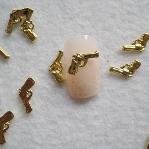 50pcs/lot Gold / Black Pistol Alloy Metal Rivets Nail Art Decor Decorations Supplies DIY Nails Accesorios Jewelry Designs Charms