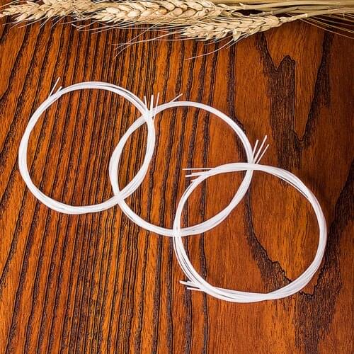 Elegant 4pcs Ukulele/Guitar Strings Replacement Part for 21/23/26in Ukulele Guitar Nylon Material Guitar Parts Accessories White