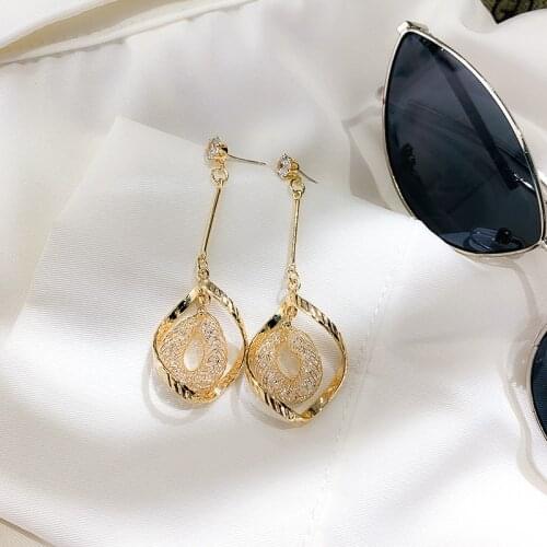 Geometric cool wind Earrings French retro metal spiral design long earrings