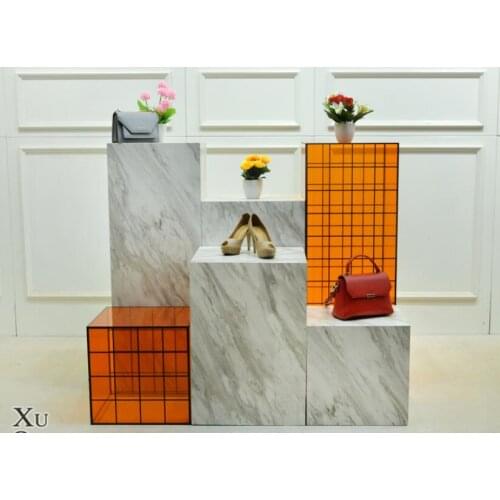 Clothing store display table water table acrylic display table wooden imitation marble high and low platform