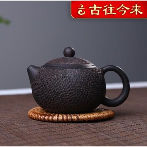 Through the ages, yixing recommended pure manual famous authentic black mud copy iron xi shi pot of tea set