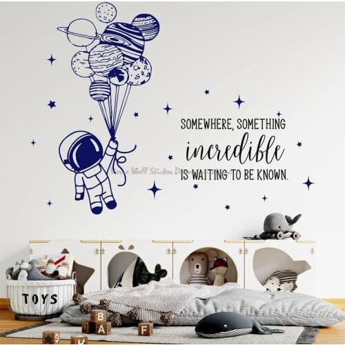 Astronaut holding balloon wall sticker spacesuit planet with customizable name childrens baby room decoration vinyl decal gift