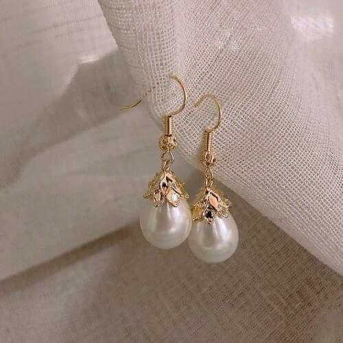 Simple and versatile oval pearl earrings for women wholesale