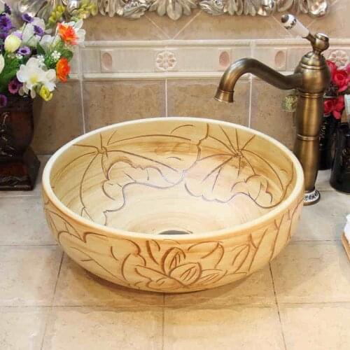 China Artistic Handmade Counter top Ceramic Bathroom Vessel Sink ceramic art wash basin lotus carving