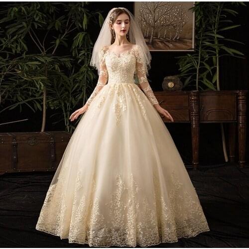 2020 New Long Sleeve Champagne Lace Wedding Dresses Luxury Lace Embroidery Ball Gown Floor Length Wedding Gowns Vestido De Noiva