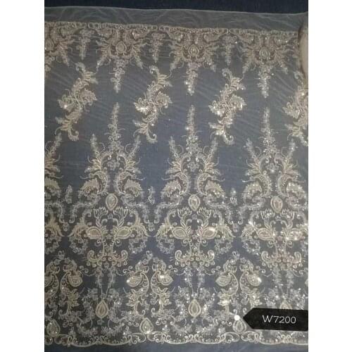 Hot selling champagne gold embroidery design bridal lace fabric sequins and bone line beads in India 10yards