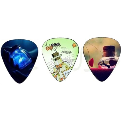 Colored 0.6MM/0.71MM/0.73mm guitar pick, 31*26mm size guitar pick,any logo can customized guitar picks