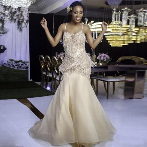 2020 Luxury Beading Spaghetti Strap Mermaid Prom Dresses Champagne Pearls Tassel Evening Gown Formal Party Dress robe de soiree