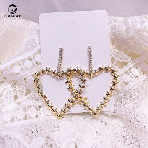 Dongdamen earrings South Korea Personality Star Wispy Love Flash crystal Non allergic needle Earrings Temperament Net red 761