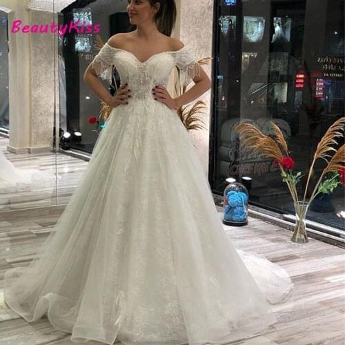 A-Line Princess Wedding Dresses 2021 Off The Shoulder Beaded Tassel Pearl Vestidos De Noiva Lace Appliques Bridal Gown for Women