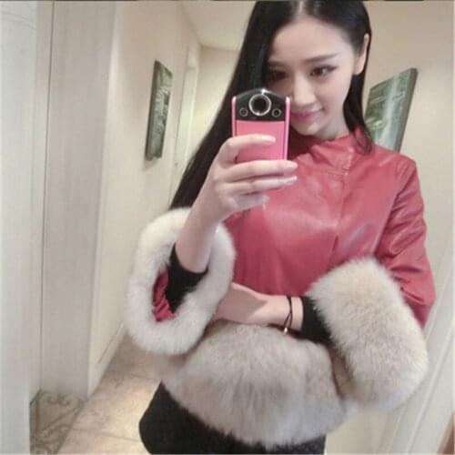 Autumn and winter PU leather stitching imitation fox fur grass casual stand collar cropped sleeves Korean short womens leather