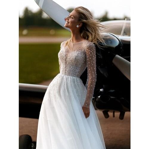 2021 New Hot Sale A-Line Wedding Dresses O Neck Illusion Full Sleeves Bridal Gowns Luxury Pearls Long Beach Wedding Dress