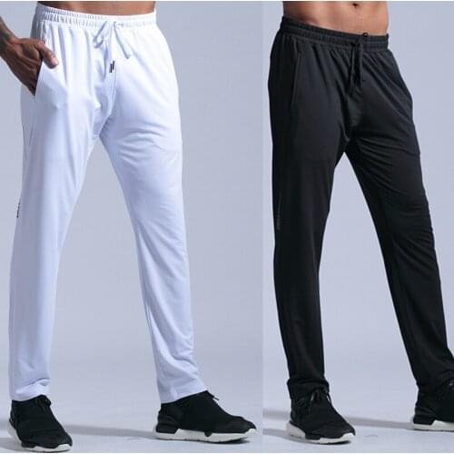 New White/Black Men Training Pants Running Sports hotwinter Basketball Gym pants Exercise Fitness Long Trousers Loose Pants