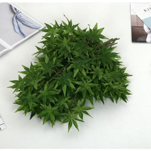 A single fake flower 3 branches Red and Green Maple Leaf artificial flower Interior works decorate plant walls
