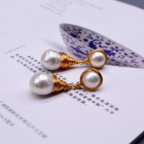 Exaggerated female earrings, pearl earrings, white baroque pearl flame ball pearls, handmade creative jewelry, womens jewelry