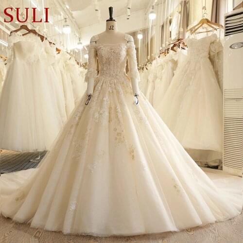 SL-7808 Church Strapless Backless Lace Appliques Beads Three Quarter Sleeve Wedding Dress 2017