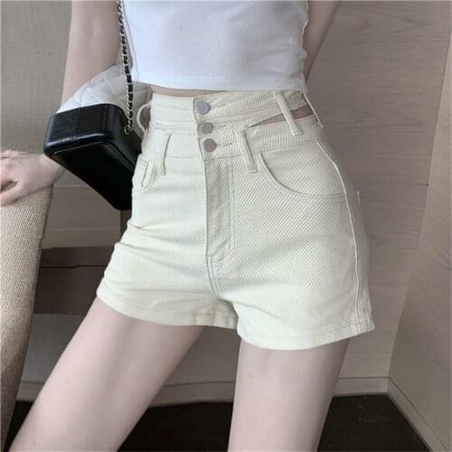 Chic irregular high-waist denim shorts package hip hot trend 3 buttons apricot hole waist short trousers for women