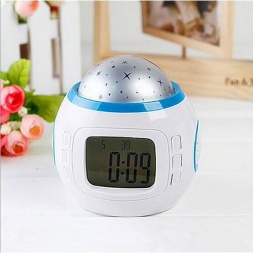 Manufacturers selling music stars projection clock Calendar clock Discus the alarm clock Colorful electronic projection lamp