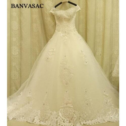 BANVASAC 2017 New Elegant Embroidery V Neck Wedding Dresses Short Cap Sleeve Satin Crystals Bowknot Lace Bridal Ball Gowns
