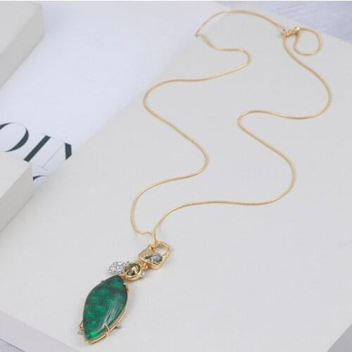 Personality design European and American fashion halo dyed green resin expensive long money chain sweater chain girls necklace