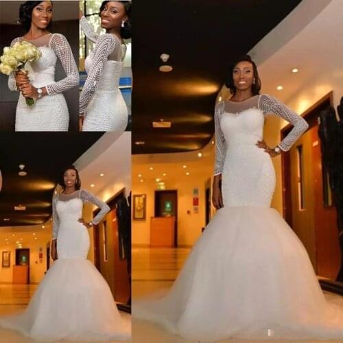 2021 African Nigeria Mermaid Wedding Dresses Jewel Neck Long Sleeves Crystal Beaded Pearls Sweep Train Custom Formal Bridal Gown