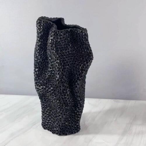 Minimalist reception hall round table black and white designer flower ornaments exhibition hall layout special shaped flower