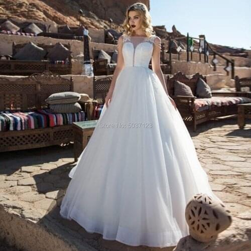 Jewel Neckline A Line Princess Wedding Dresses with Chic Beaded Sleeves 2021 Sexy Backless Lace Appliques Bridal Gowns Vestidos
