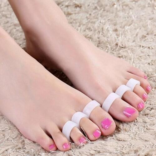 1 Pairs =2 Pcs Thumb valgus protector Bunion adjuster Hallux Valgus Guard Feet Care Silicon Gel Foot corrector Toe separator