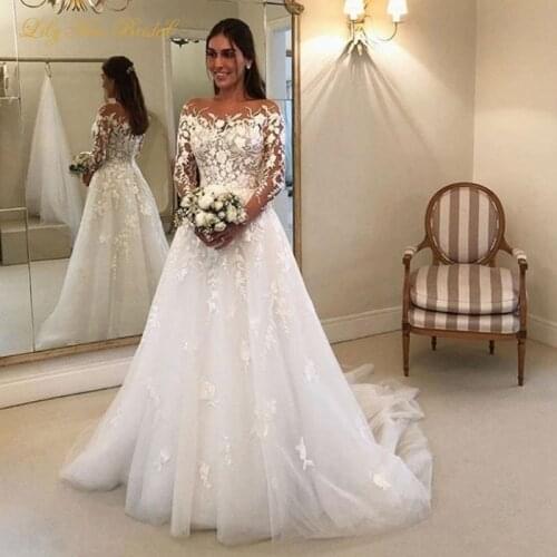 Illusion Long Sleeve Wedding Dress Sheer Neck Lace Appliques Tulle Bridal Gowns with Sweep Train