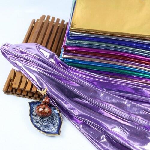 Super soft four-sided stretch bronzing cloth Stage performance clothing elastic decorative background cloth Golden fabric