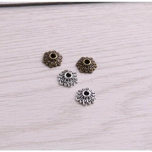 SWEET BELL 200pcs 8*9mm Two Color Receptacle Hollow Small Flower DIY Spaced Jewelry Accessories Charms For Jewelry Making