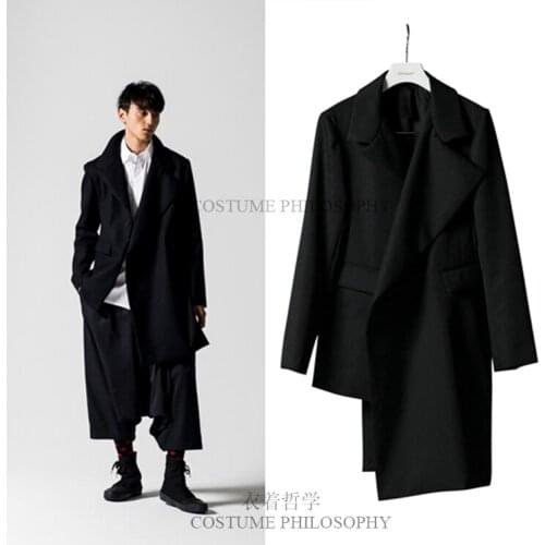 Fashionable mens and women trench coat is irregular, asymmetrical, and loosely tailored for autumn and winter. S-6XL