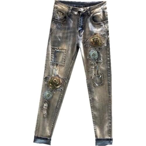 Wholesale appliques with diamond rivet beading embroidery denim jeans female fashion tassel patchwork jeans wq1749 factory