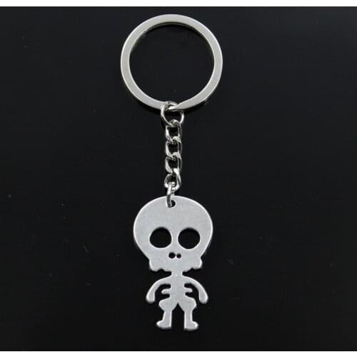 New Keychain 39x23mm Alien ET Bones Pendants DIY Men Car Key Chain Ring Holder Keyring Souvenir Jewelry Gift